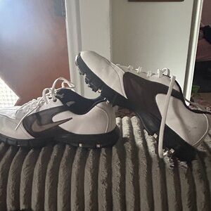 Nike Black and White golf cleats .